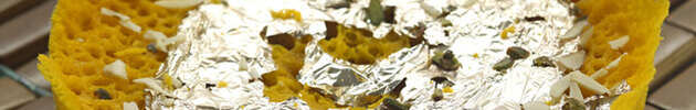 ghevar-dipped-in-sugar-syrup